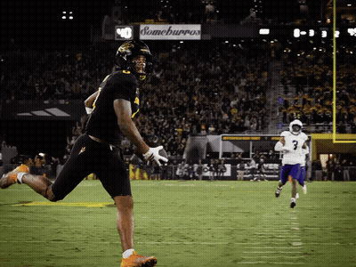 Cowboy Hat Mascot Says Go Pokes On Football Field GIF