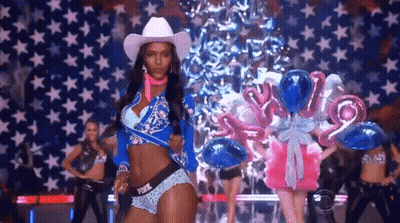Cowboy Hat Woman Dancing On Stage With Balloons GIF