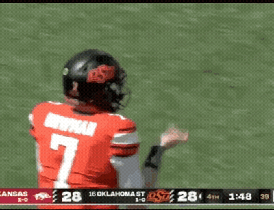 Cowboy In Orange Hat And Orange Pants GIF