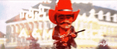 Cowboy In Red Hat Holding Gun GIF