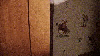 Cowboy On Horse By Cactus Wall GIF