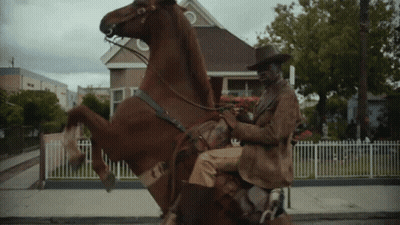 Cowboy Riding Horse On Hind Legs GIF