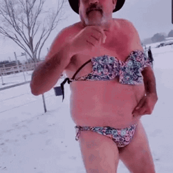 Cowboy Wearing Bikini Dancing On Snow Day GIF