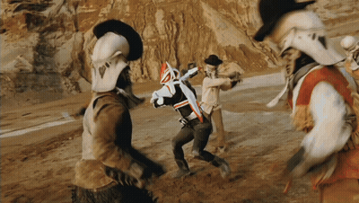 Cowboys Running In Desert With Sword GIF