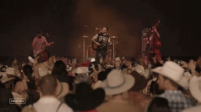 Cowboys Watching Band On Stage GIF