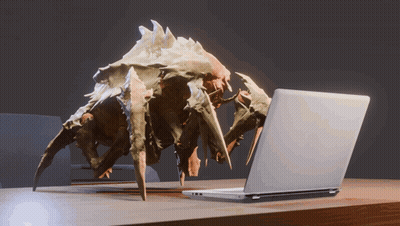 Crab Statue Looking At Laptop GIF