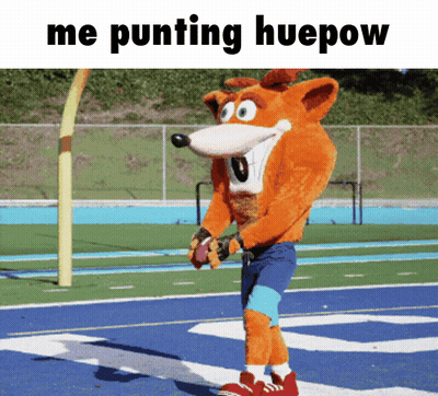 Crash Bandicoot Punting Huepow On Football Field GIF