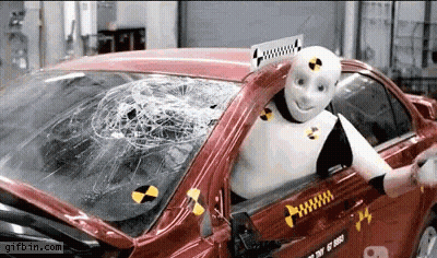 Crash Test Dummy In Red Car GIF