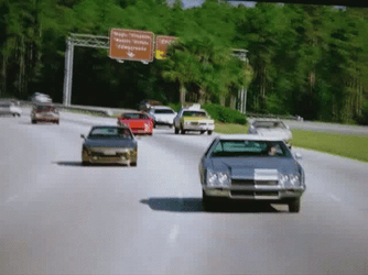 Crazy Driver And Passenger Sliding On His Seat GIF