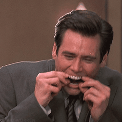 Crazy Jim Carrey Grimace Reaction GIF