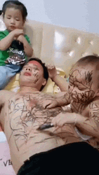 Crazy Kids Drawing On Their Dad GIF