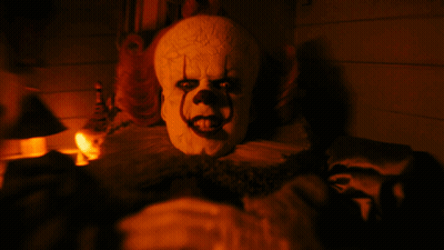Creepy Clown With Mask GIF
