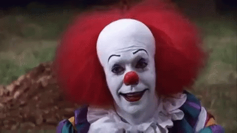 Creepy Clown With Red Hair And Red Nose GIF