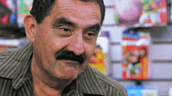 Creepy Guy Arching His Eyebrow GIF