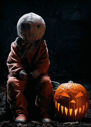 Creepy Sitting Creature With Pumpkin Lantern