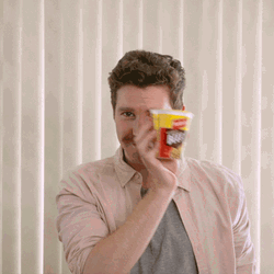 Creepy Smile Endorsing Snacks GIF