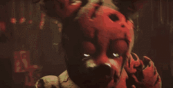 Creepy Springtrap Holding A Toy GIF