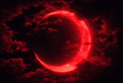 Crescent Moon Surrounded By Red Clouds GIF