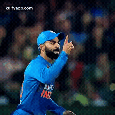 Cricket Player Giving Thumbs Up In Blue Jersey And Hat GIF