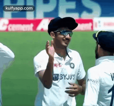 Cricket Player Giving Thumbs Up In Blue Jersey And Hat GIF