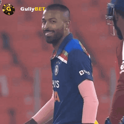 Cricket Player In Front Of Gullybet Wall GIF