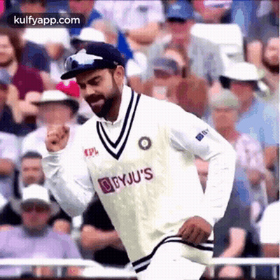 Cricket Player Running In White Jersey And Hat GIF