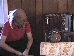 Critters Hiding Under Sofa GIF