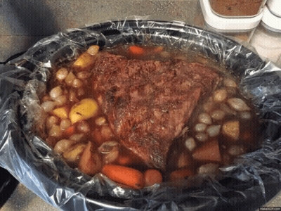 Crock Pot Filled With Meat And Vegetables GIF