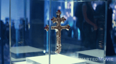 Cross In Glass Case Charted Movie GIF