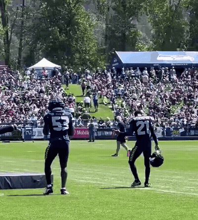 Crowd Around Bear Mascot Saying Go Bears GIF