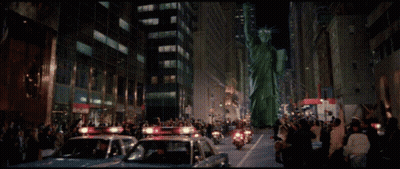 Crowd Behind Police Line Barrier GIF