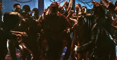 Crowd Dancing In Dark Room With Chains GIF