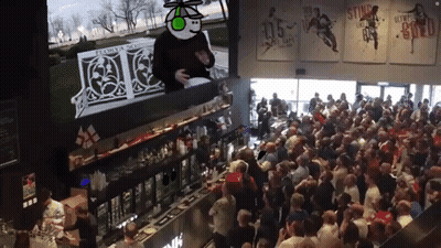 Crowd Gathered Before Screen Saying Stanley GIF