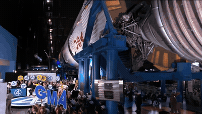 Crowd Gathered In Front Of GMA Sign GIF