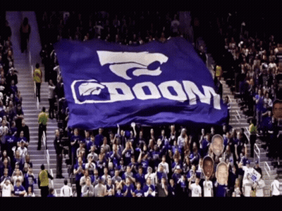 Crowd Holding Blue Banner Saying Doom GIF