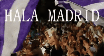 Crowd Holding Purple And White Hala Madrid Flags GIF