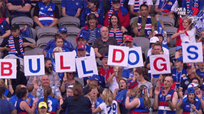 Crowd Holding Up Bulldogs Signs