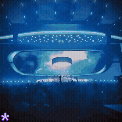 Crowd In Dark Room With Blue Light GIF