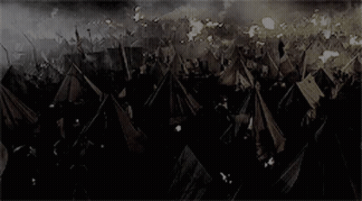Crowd In Field With Tents And Flags GIF
