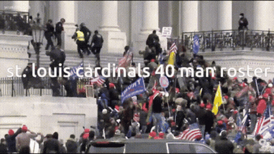 Crowd In Front Of Building With St. Louis Cardinals 40 Man Roster GIF