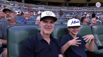 Crowd In Front Of Screen Saying Stanley GIF