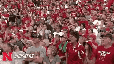 Crowd In Red Shirts Sitting In Stadium GIF