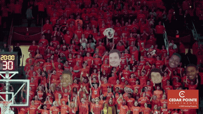 Crowd In Red Shirts With Cedar Pointe Logo GIF