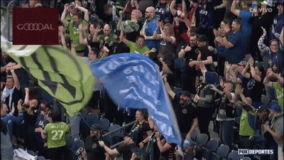 Crowd In Stadium With Goodal Banner GIF