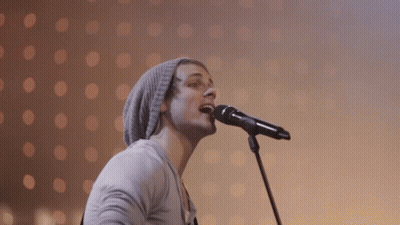Crowd Raising Hands With I Love You Bracelet GIF