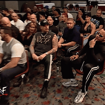 Crowd Sitting With Man In Uf Shirt GIF