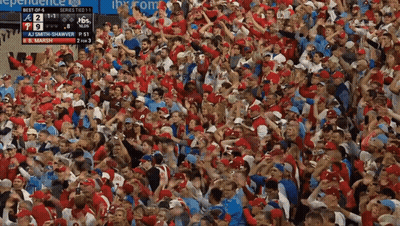 Crowd Watching Baseball Game With Independence Scoreboard GIF