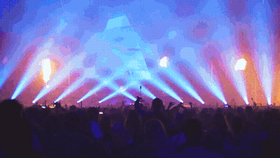 Crowd Watching Concert With Blue Lights GIF