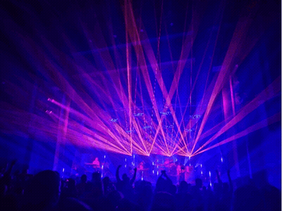 Crowd Watching Concert With Purple And Orange Lights GIF