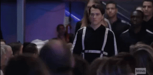 Crowd Watching Model Walk Runway GIF
